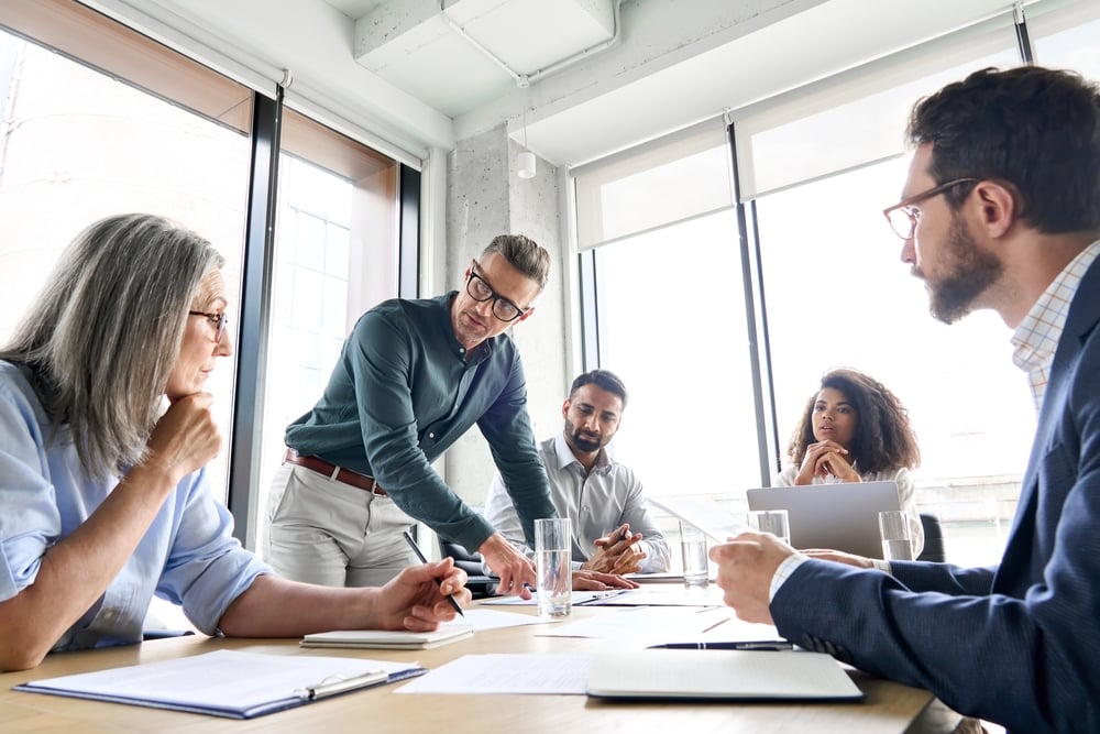 A team meets in preparation to open their new resale channel