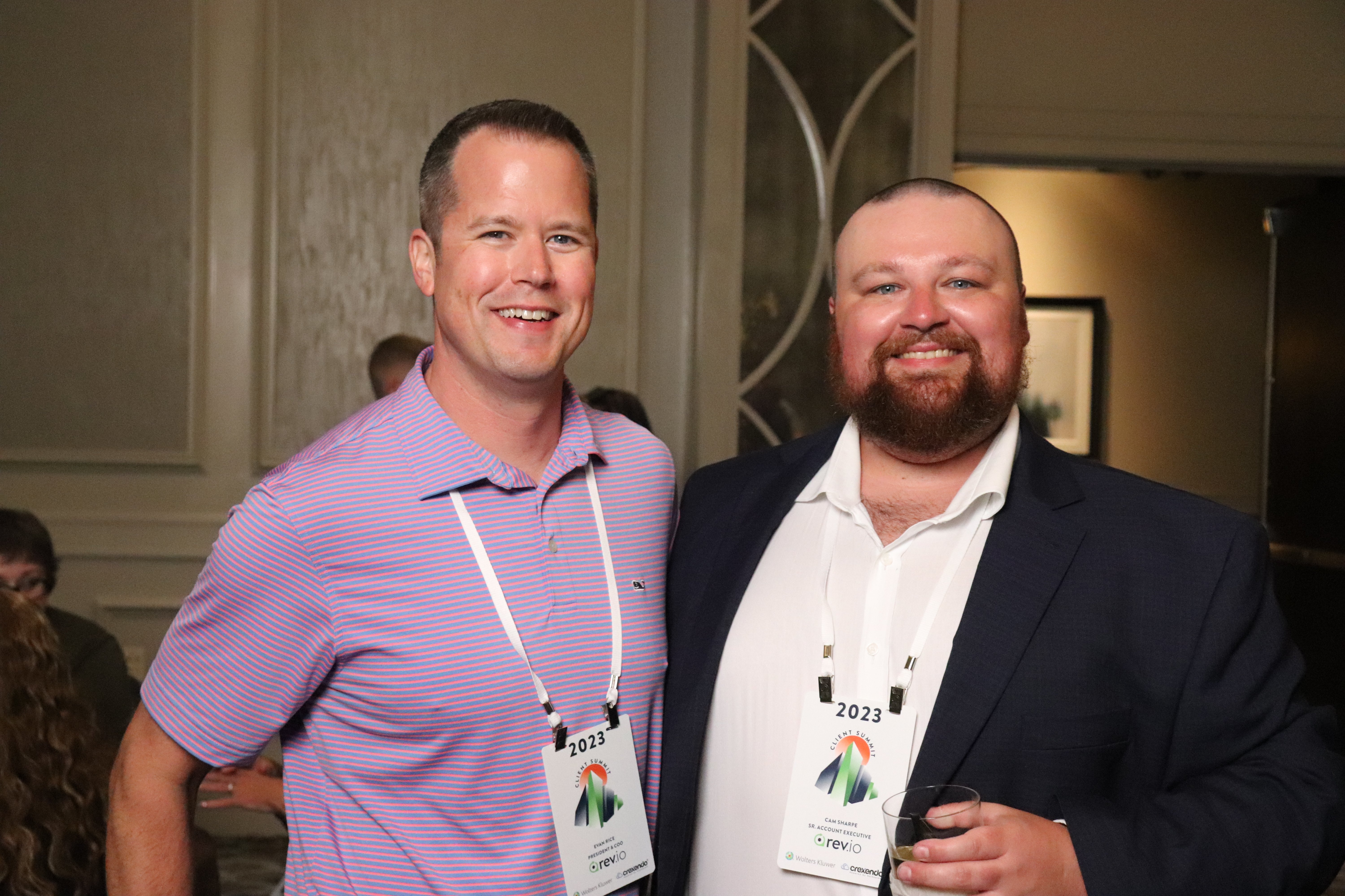 Rev.io speaker at company event